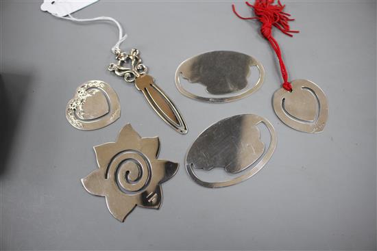 Six assorted modern silver bookmarks, of varying designs, including a pair of oval, engraved with a pig and an Italian ornate dagger.